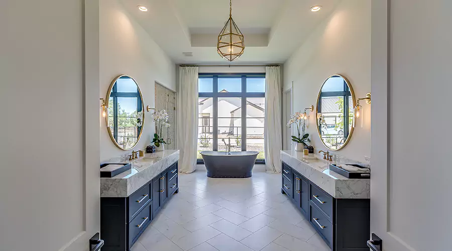 Spacious Luxury Bathroom With Double Vanity and Freestanding Bathtub